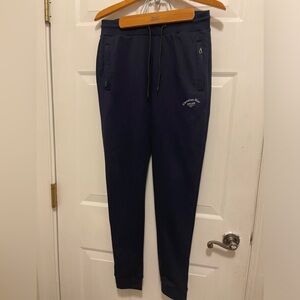 Navy blue sweatpants Medium fits perfectly  front with signature logo and label